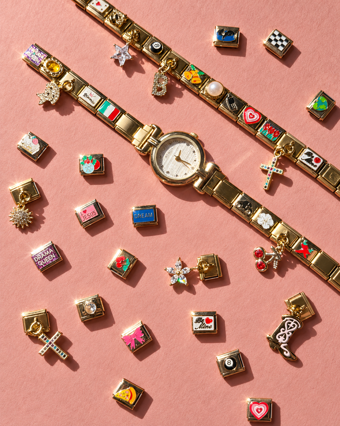 Italycharm watch, charm bracelets and loose charms on a pink background