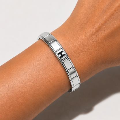 Black Letter H – silver Italian charm worn on an Italian charm bracelet