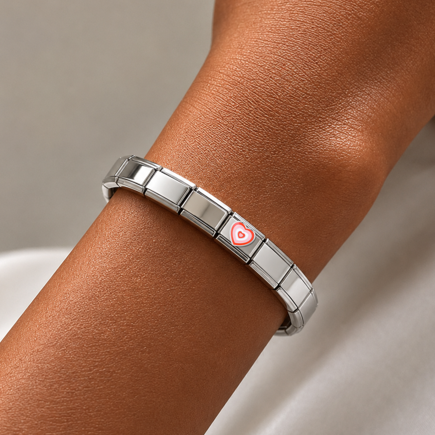 Fluttering Red Heart – silver Italian charm worn on an Italian charm bracelet