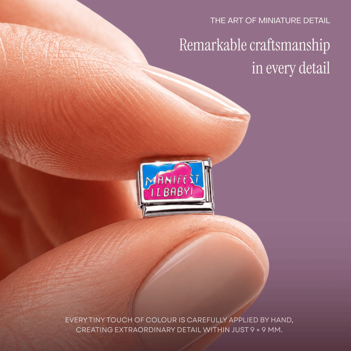 An Italycharm enamel charm held between two fingertips: every tiny touch of colour applied by hand within 9 × 9 mm